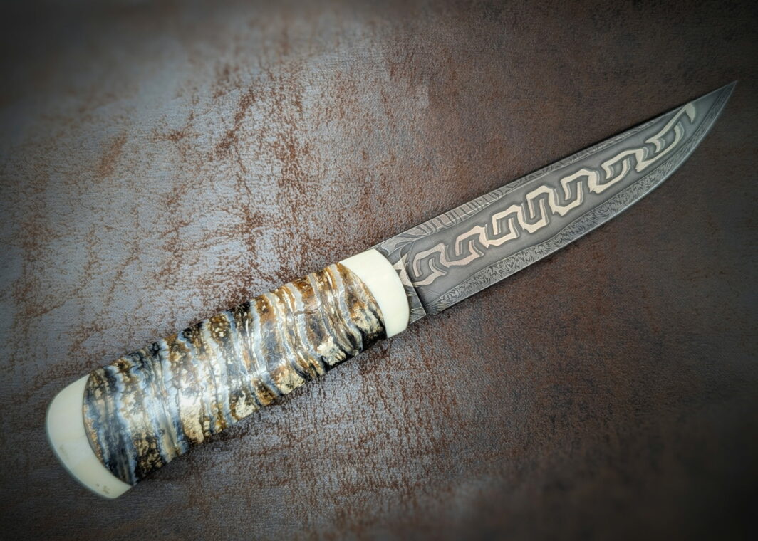 Molaire de mammouth Couteau ouvert Coté droit